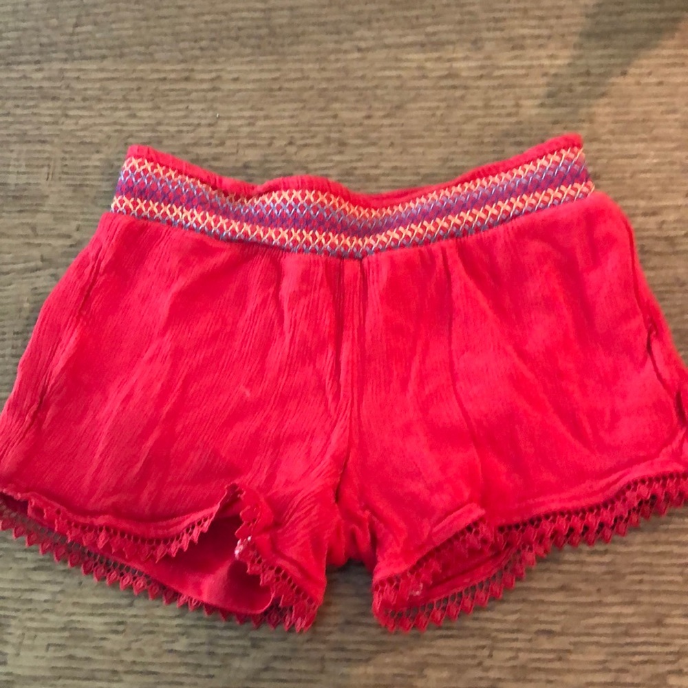 Bright red shorts
